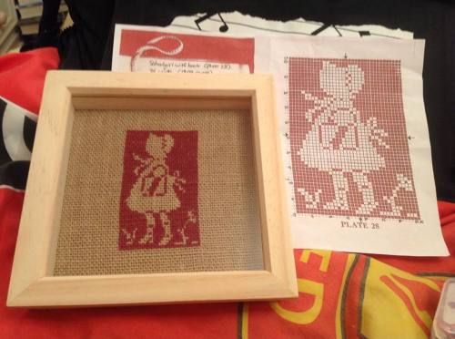 Cross stitched book girl in frame